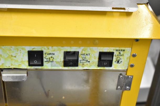 2019 OY-828 Metal Commercial Popcorn Machine, 120 Volts, 1 Phase, control panel detail with turn, heat, warm/light switches.