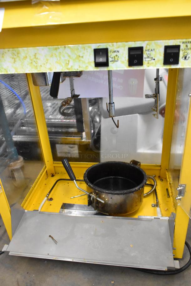 2019 OY-828 Metal Commercial Popcorn Machine, 120V, 1 Phase. Features manual switches. Visible wear on surfaces.