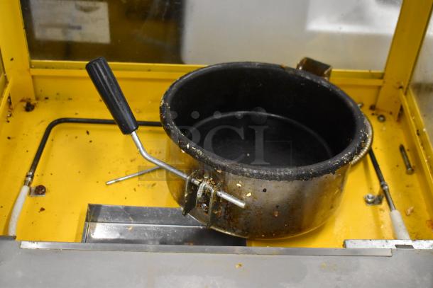 2019 OY-828 Metal Commercial Popcorn Machine, used condition, 120 Volts, 1 Phase, visible wear on metal components.
