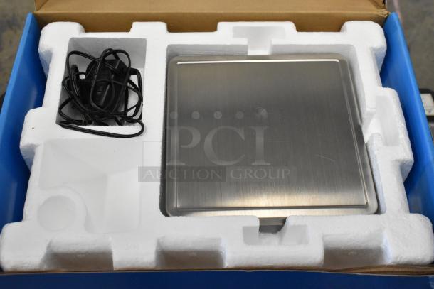 Brand new AvaWeigh 334PCN20 20 lb. legal for trade portion scale in packaging, charger included. Some minor scratches visible.