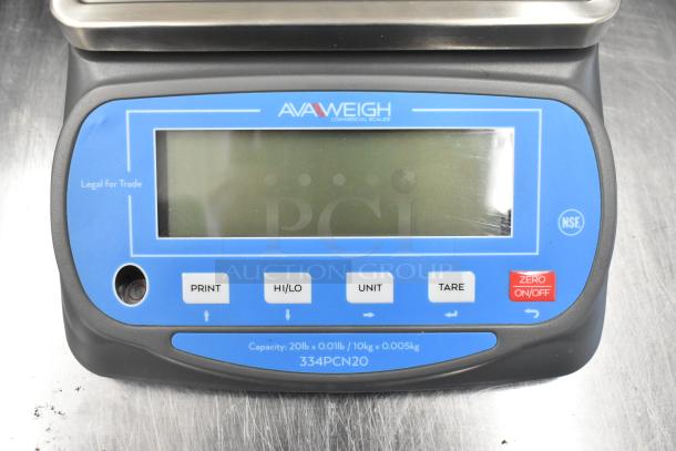 Brand new AvaWeigh 334PCN20 20 lb. Legal for Trade portion scale with minor scratches. Functions: print, tare, unit conversion.