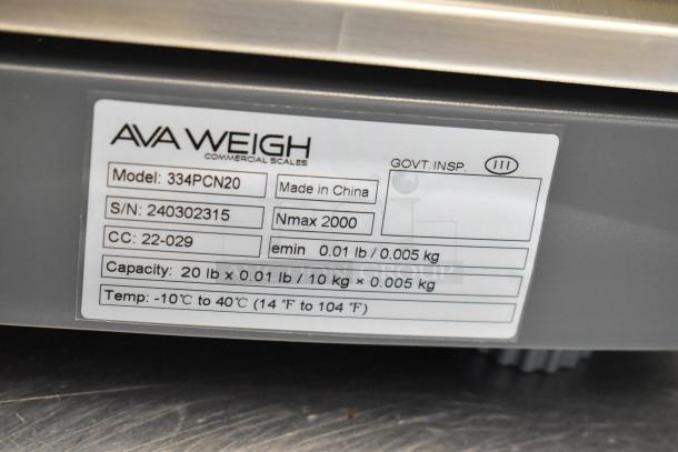 BRAND NEW AvaWeigh 334PCN20, 20 lb. Legal for Trade Portion Scale, minor scratches, made in China, model label visible.