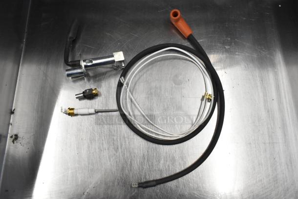 3 new Blodgett parts: 56464 Pilot Burner LP, 56385 Door Handle, 54725 Spark Module. Slight scratches, fully functional.