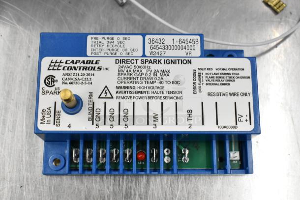 Blodgett 54725 Spark Module, new, with labels showing Capable Controls specs, includes wiring terminals and voltage warnings.