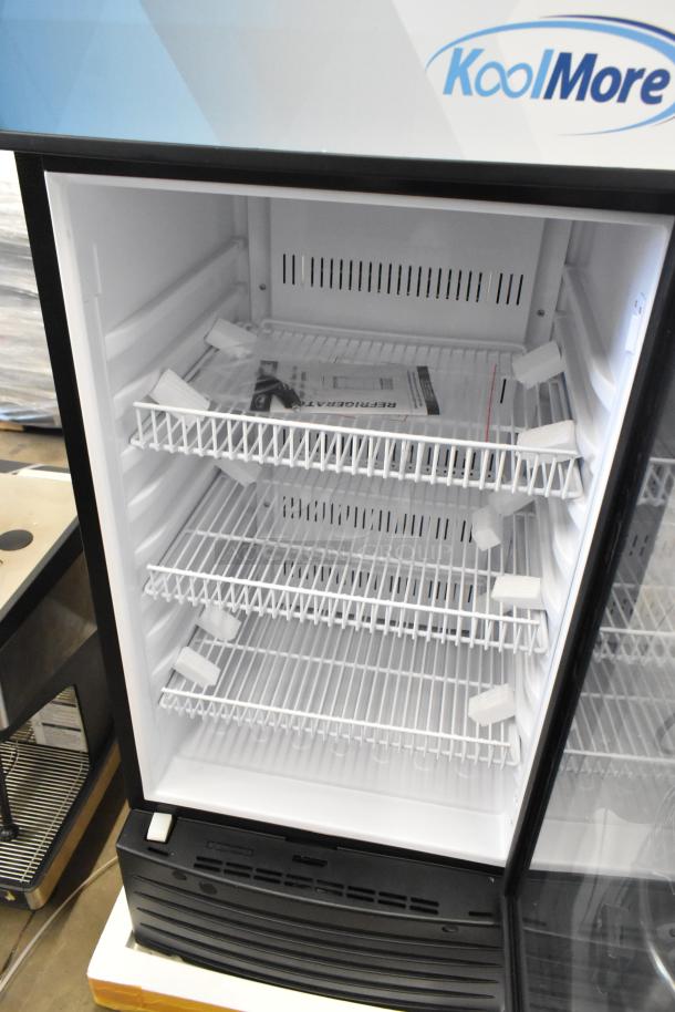 New KoolMore KM-MDR-1D-6C cooler with poly-coated racks, single door design, 115V, 1 phase. Tags inside detail features.