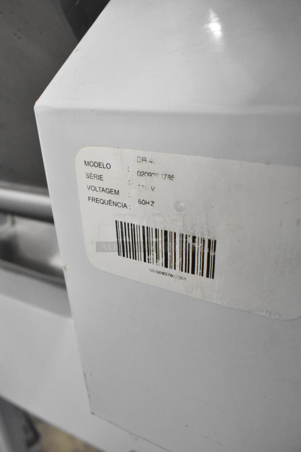 Fleetwood DR-400 bread slicer, metal commercial floor style. Model label shows 115V, 1 phase, 60Hz, serial number 0209021785.