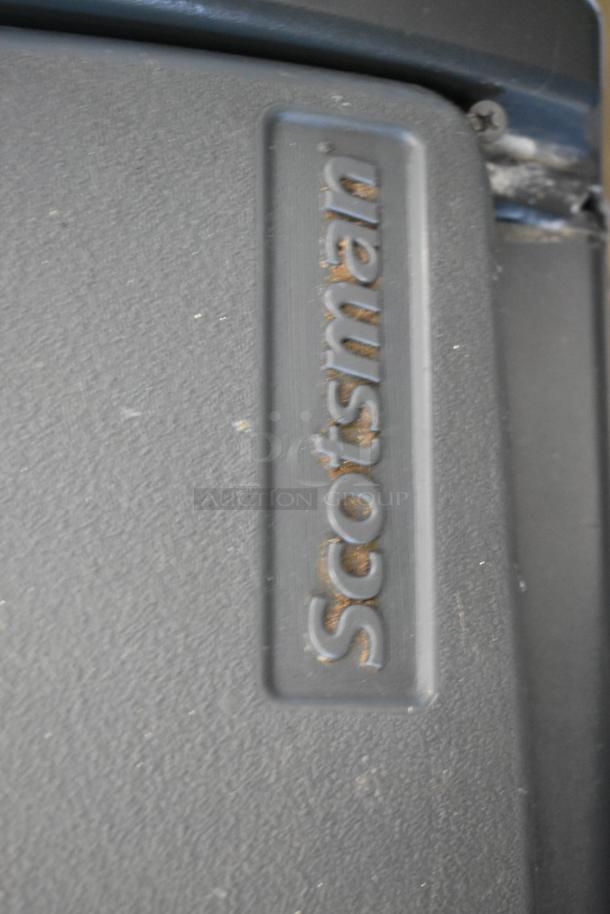 Scotsman Prodigy CU1526SA-1A ice machine, stainless steel; visible wear. Branding on surface. 115V, 1 phase.