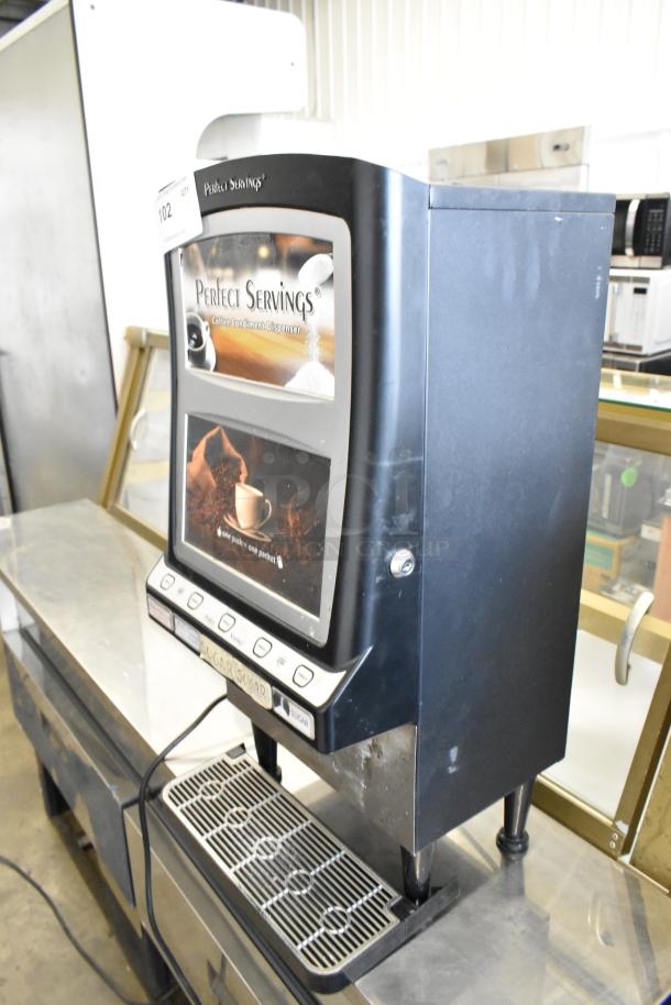 United Food Group UV-PSPD-5 Dispenser, black metal finish, countertop model, for cappuccino, 120V, labels intact, used condition.