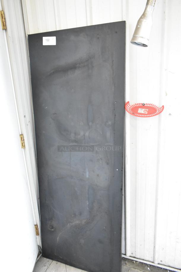 Black metal panel, lightly worn, corner tag marked "122". Auction includes two panels, doubling bid value.