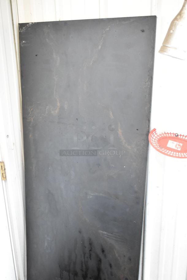 Two large black panels with slight markings, suitable for multiple uses. Offer includes doubling your bid amount.