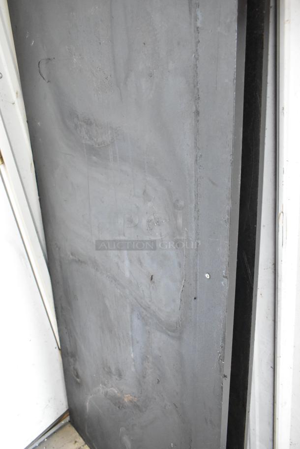 Two large panels, gray and possibly metal, with a smooth surface and some visible wear. Auction offers 2x bid value.