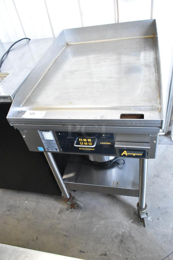 AccuTemp EGF2083A2450 stainless steel electric griddle, 208V, 3 phase, with under shelf on casters, used condition.