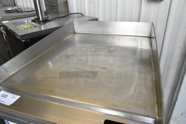 AccuTemp EGF2083A2450 stainless steel griddle with metal under shelf on casters, 208V, 3-phase, commercial use.
