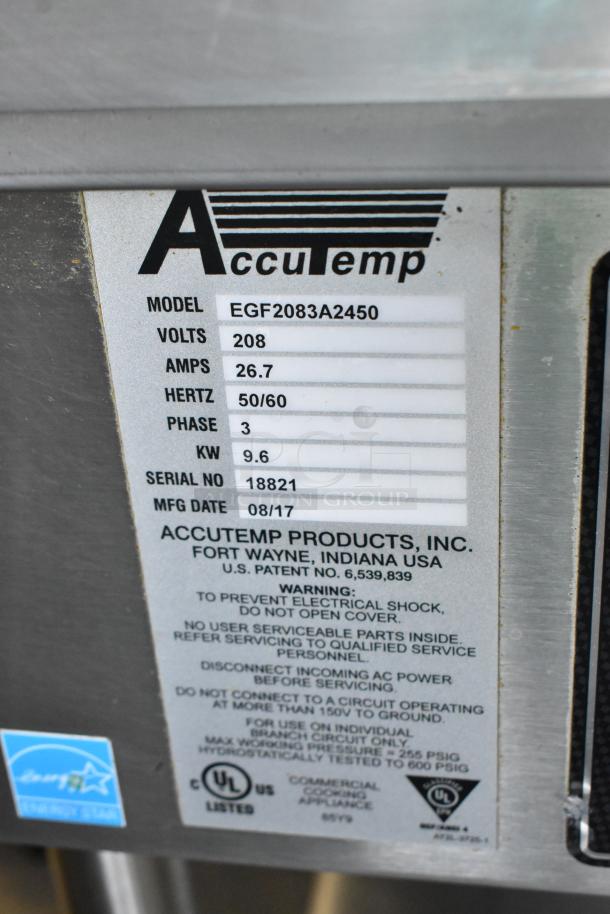 AccuTemp EGF2083A2450 stainless steel commercial griddle data tag showing 208 volts, 3 phase, 26.7 amps, made in 08/17.