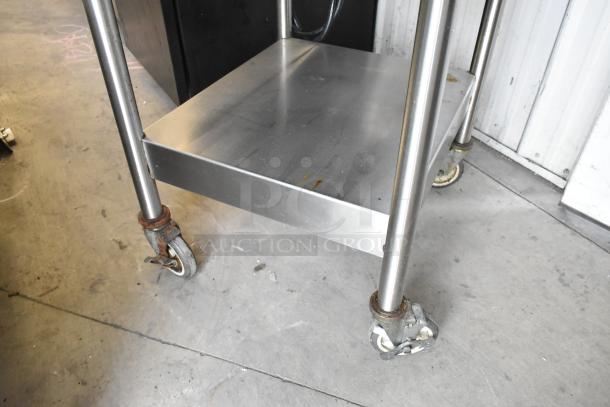 AccuTemp EGF2083A2450 stainless steel electric griddle on casters, with metal under shelf, 208V, 3-phase, commercial use.