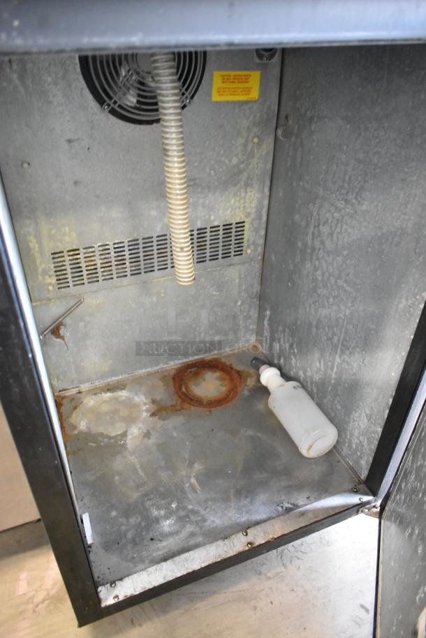 Micro Matic MDD-23 kegerator interior, showing wear and rust. Features commercial casters, 115 volts, 1 phase.