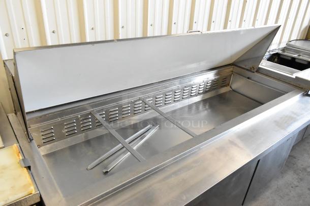 Avantco 178SCLM3 stainless steel sandwich salad prep table, mega top, commercial casters, 115V, 1 phase, used condition.