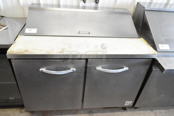 Ikon KSP48 commercial stainless steel prep table with mega top, bain marie, and commercial casters. 115 volts, 1 phase.
