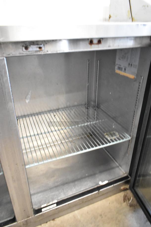 Spartan SSGBB-60 metal 2-door undercounter cooler, commercial-grade, visible interior shelving, used condition. 115V, 1 phase.