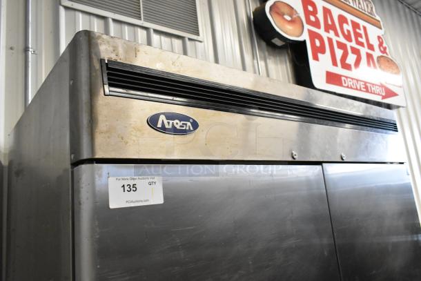 2020 Atosa MBF8503GR stainless steel commercial 2-door reach-in freezer, poly coated racks, metal pan rack, on casters.