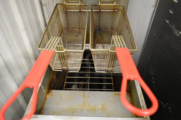 2023 Ikon IGF-35/40-NG stainless steel commercial gas fryer with 2 metal baskets, red handles, on casters. 90,000 BTU.