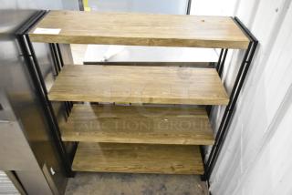 Wooden 4 tier shelving unit with metal frame. Natural wood finish, good condition, ideal for storage or display.