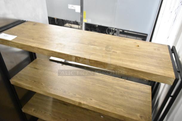 Wooden 4 tier shelving unit with natural finish and metal frame. Appears in good condition, ideal for storage or display.