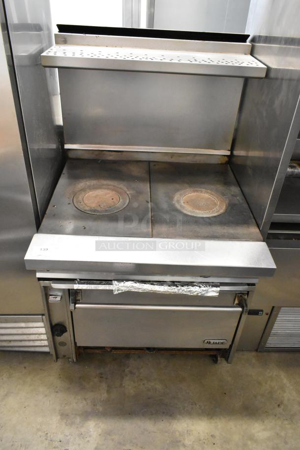 Stainless steel Jade 2-burner gas range with oven, over-shelf, and backsplash on commercial casters. Visible Jade logo.