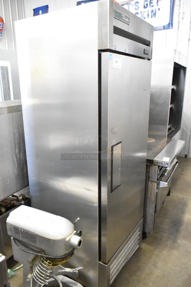True T-23F-HC stainless steel commercial reach-in freezer, single door, with metal pan rack, 115V, 1 phase.