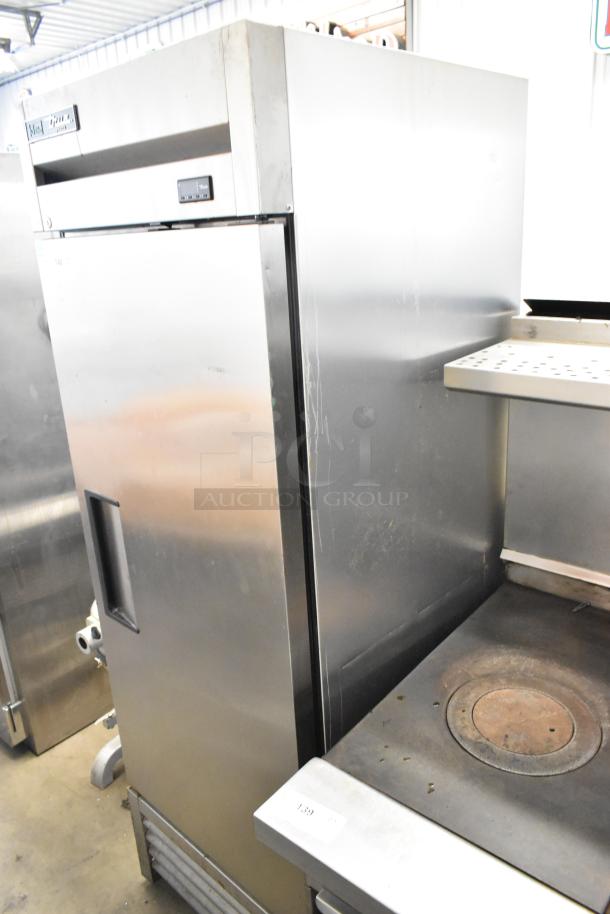 True T-23F-HC stainless steel commercial single door reach-in freezer, includes metal pan rack, 115V, 1 phase.