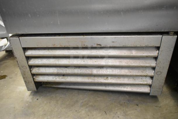 True T-23F-HC stainless steel commercial freezer with single door and metal pan rack. 115V, 1 Phase. Used condition.