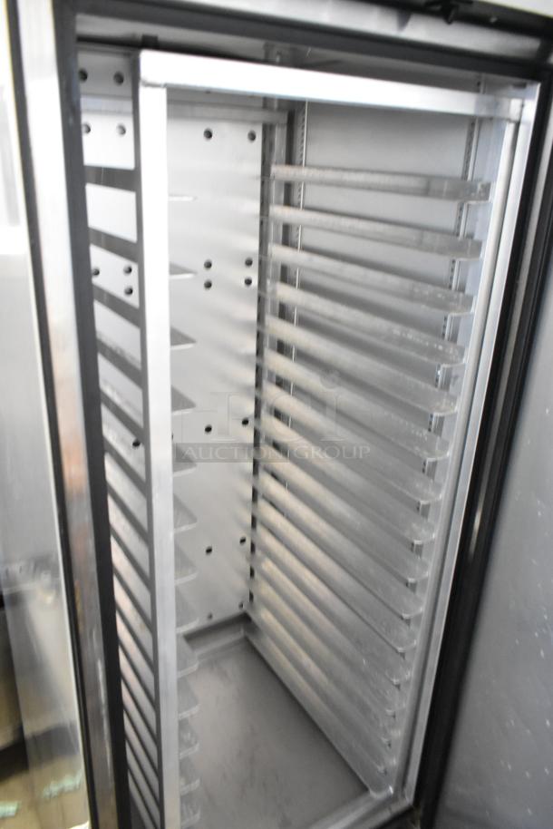 True T-23F-HC stainless steel commercial freezer with metal pan rack, single door. 115V, 1 phase, excellent condition.