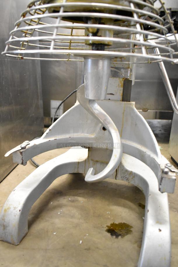 Presto PM-20 commercial 20-quart dough mixer with bowl guard. Visible wear, metal construction, 115 volts, 1 phase.
