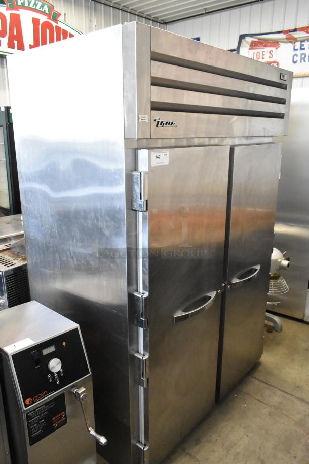 2018 True STA2F-2S stainless steel 2-door commercial freezer, 115 volts, 1 phase. Clean exterior with visible branding.