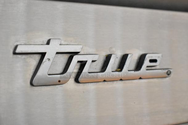 True STA2F-2S logo on stainless steel commercial reach-in freezer, model 2018.