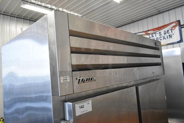 2018 True STA2F-2S stainless steel 2-door commercial freezer, 115 volts, 1 phase. Good condition, visible labels.