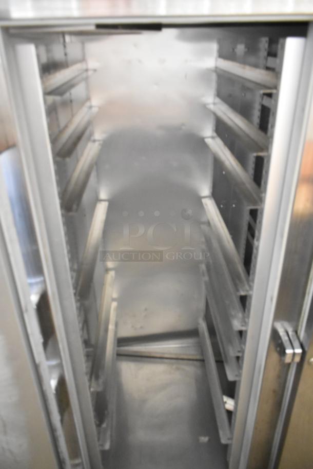 2018 True STA2F-2S stainless steel 2-door commercial freezer, interior view, showing clean shelves, 115V, 1 Phase.
