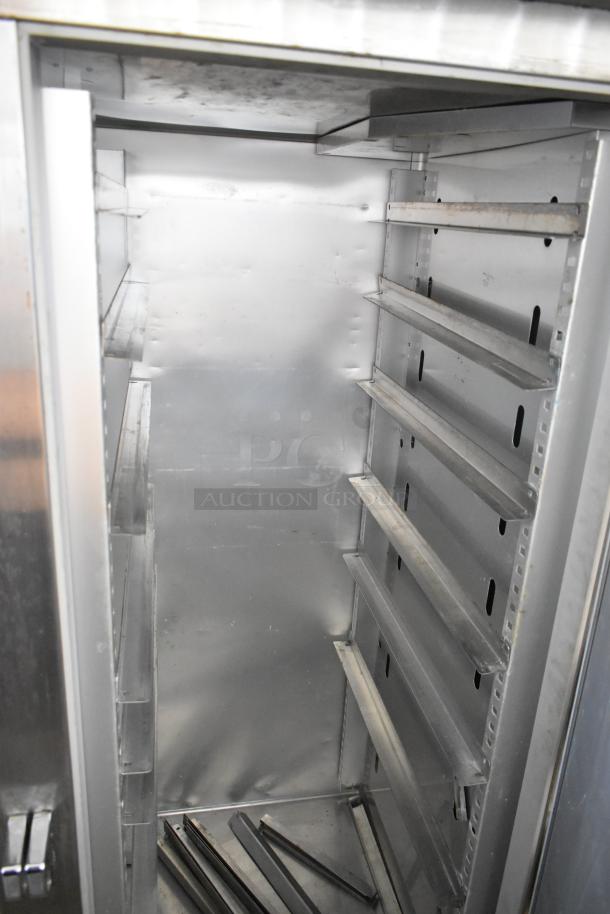 2018 True STA2F-2S stainless steel commercial 2-door reach-in freezer, empty interior with adjustable shelves, 115 volts, 1 phase.