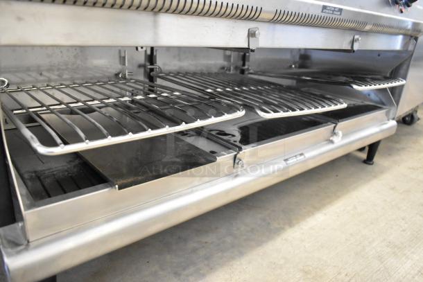 Hatco TFWM-3939 Wall Mounted Thermo-Finisher, metal, commercial, 208V 3 Phase, with open rack design, shown in good condition.