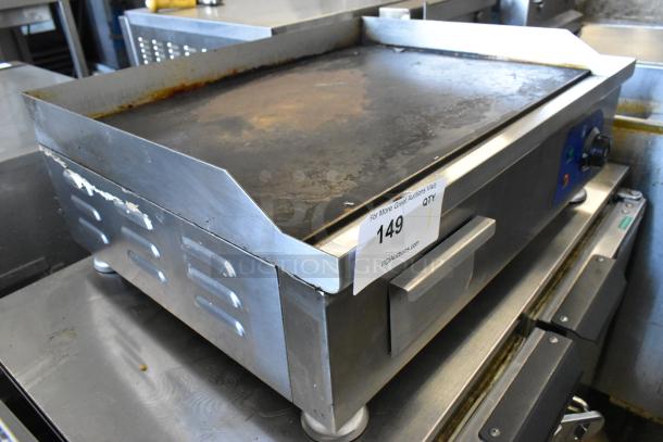 Stainless steel commercial electric griddle, flat top, 110 volts, used condition with discoloration, PCI Auctions label with lot number 149.