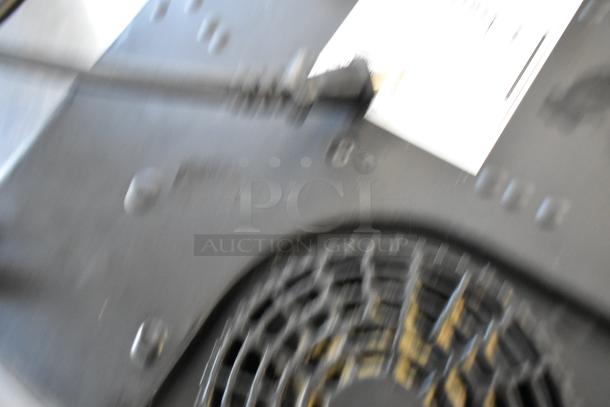 Blurry image of damaged induction range parts, including a power cord and vent. Includes 2019 Secura 8100MC and CookTek MC2502F models.