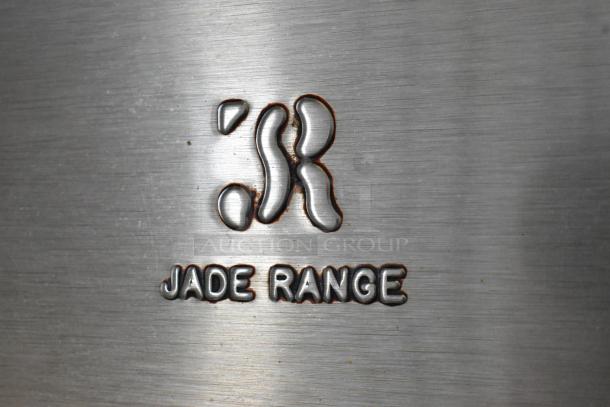 Jade Range J9R-6-36 stainless steel detail with embossed logo. Commercial kitchen equipment branding.