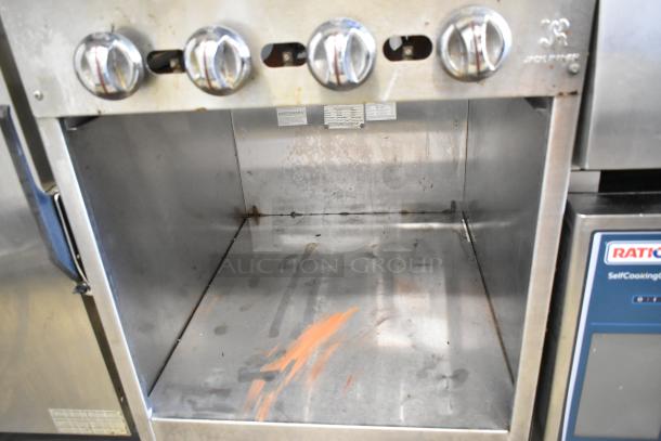 Jade Range JSR-24B stainless steel charbroiler grill, natural gas, with knobs, back splash, under shelf, used condition.