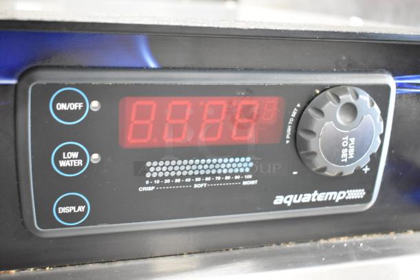 CresCor H137WSUA6D control panel with on/off, low water indicators, digital display, humidity settings, and aquatemp branding.