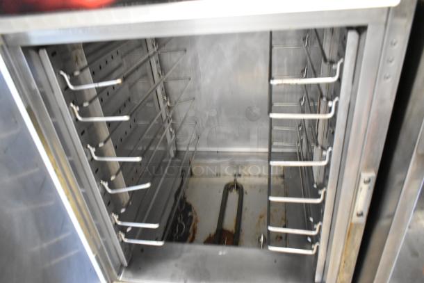 CresCor H137WSUA6D stainless steel heated holding cabinet interior with multiple adjustable racks. 120 volts, 1 phase.