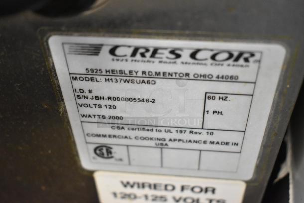 CresCor H137WSUA6D stainless steel heated holding cabinet label showing model, serial number, 120 volts, and 2000 watts.