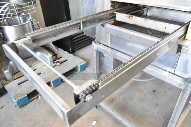 Belshaw TG50 stainless steel commercial thermoglazing station on casters, showing chain mechanism. 208V, 1 phase.