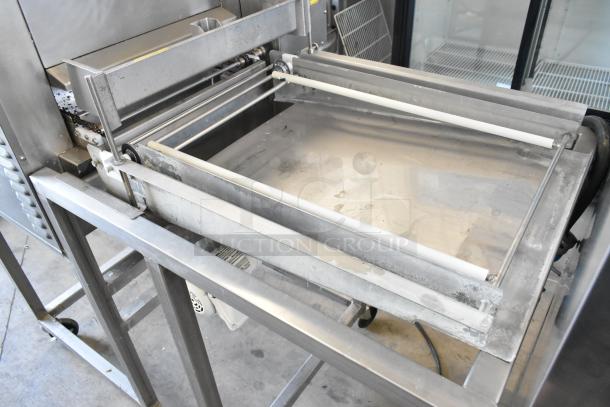 Belshaw TG50 stainless steel commercial thermoglazing station, floor style, on casters, 208V, 1 phase, in used condition.