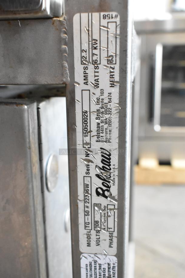 Belshaw TG50 stainless steel commercial thermoglazing station on casters, 208V, 1 phase. Model and serial number tags visible.
