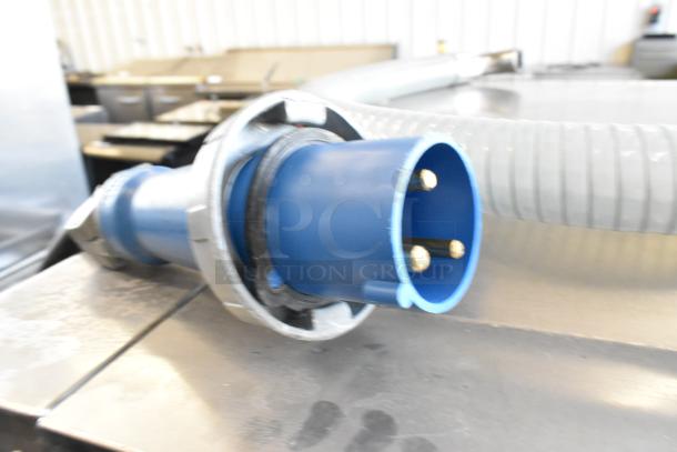 Belshaw TG50 stainless steel thermoglazing station, commercial casters, 208V, 1 phase, blue industrial plug visible.